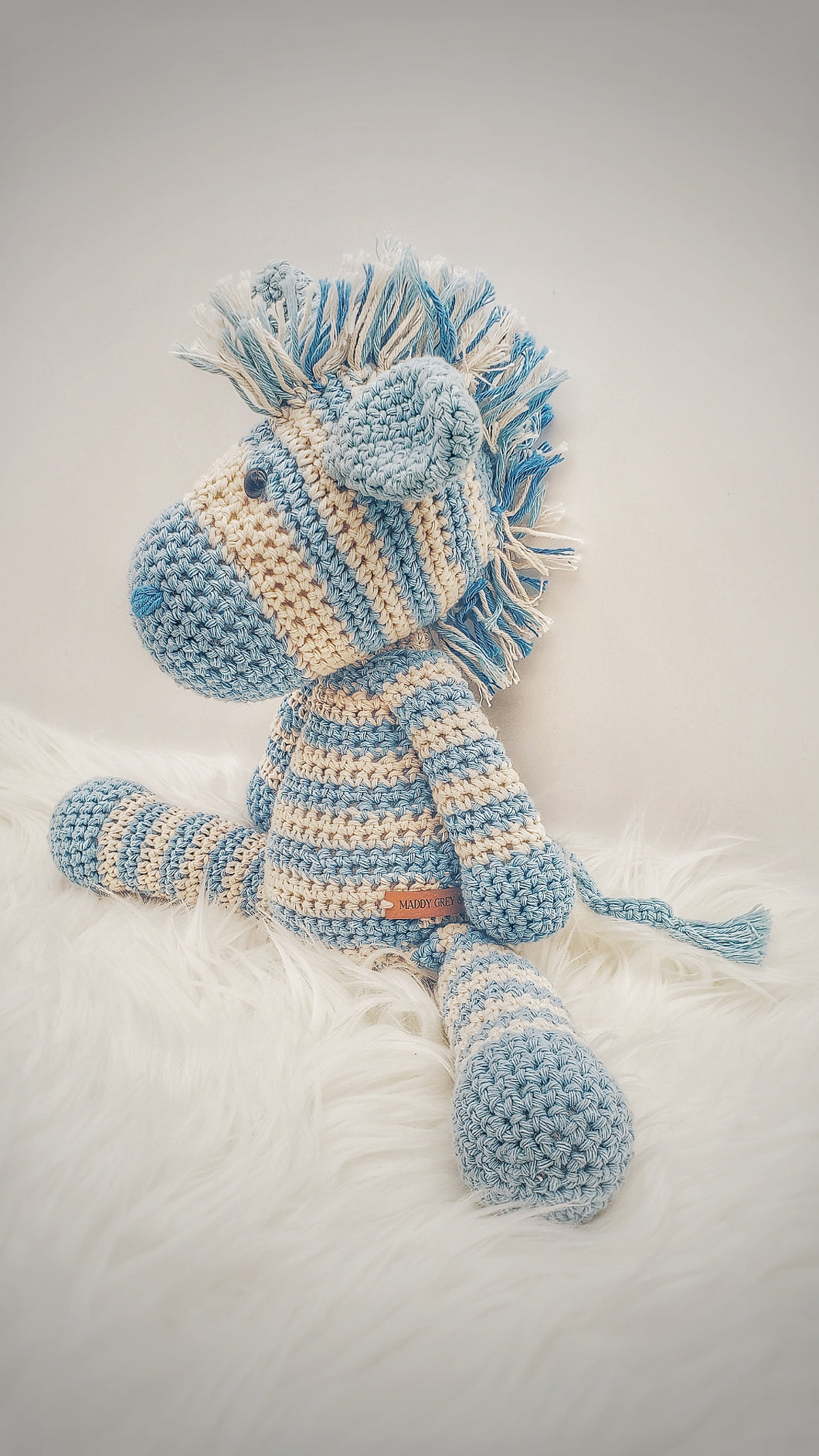 His name is Peter. Handmade Crochet Blue Zebra Gift Box